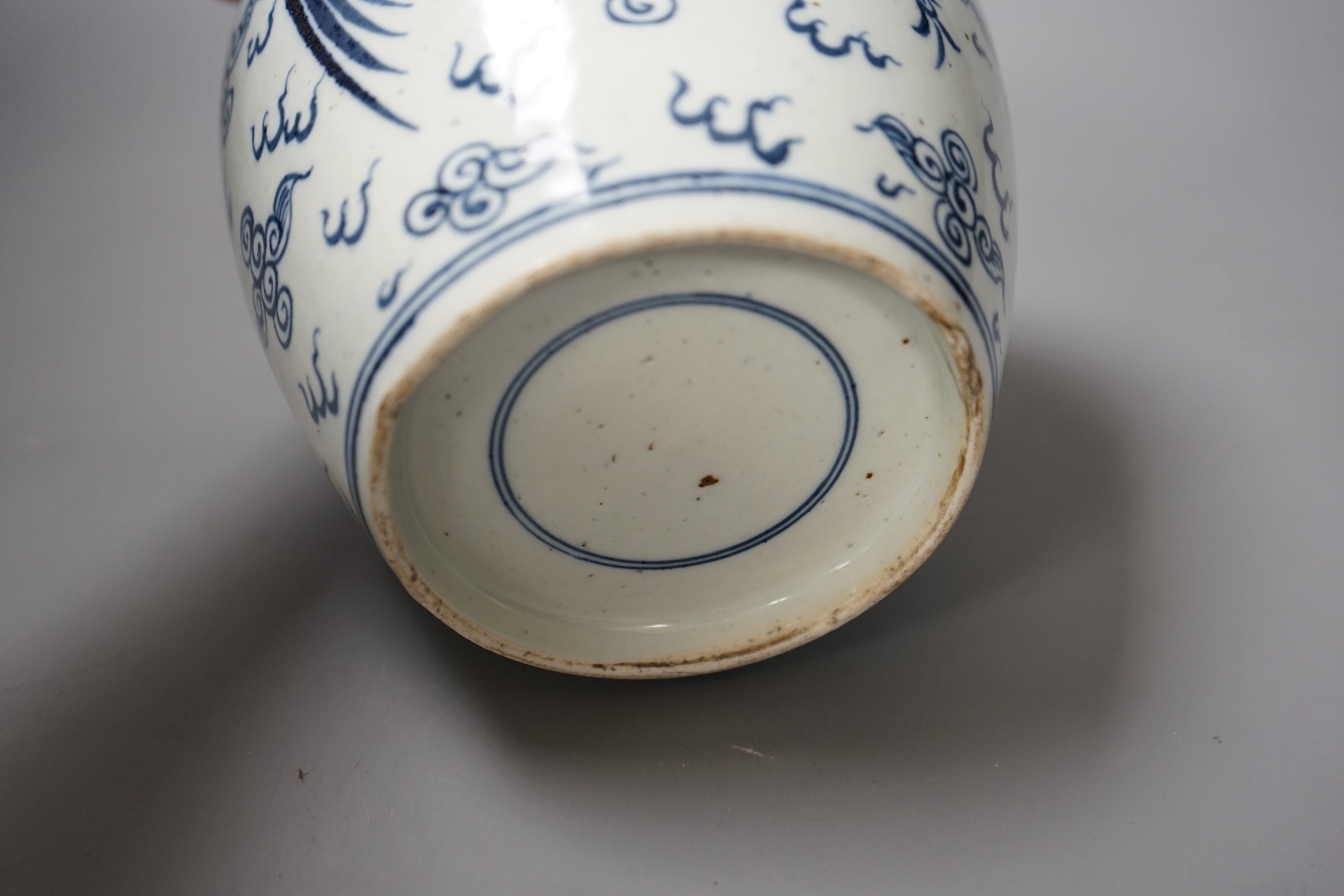 A Chinese blue and white 'phoenix' jar, 17cm